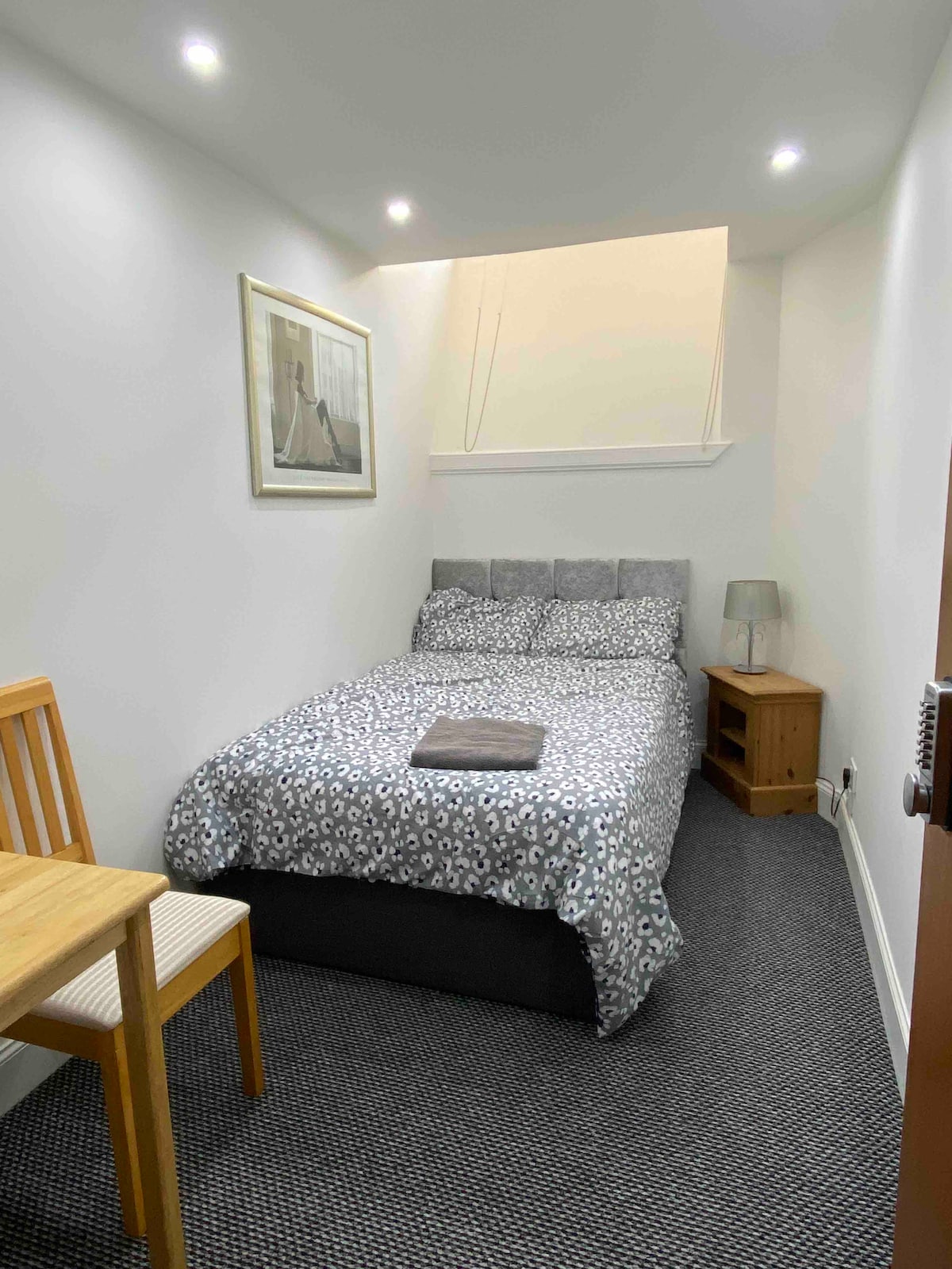 Bedroom at Comfortable single room with small double bed in the Holyrood Park area, Edinburgh