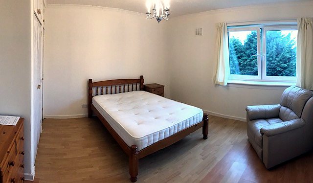 Bedroom at Renovated Bright Two-Bed Flat With Balcony, Cameron Toll / south-east Edinburgh.