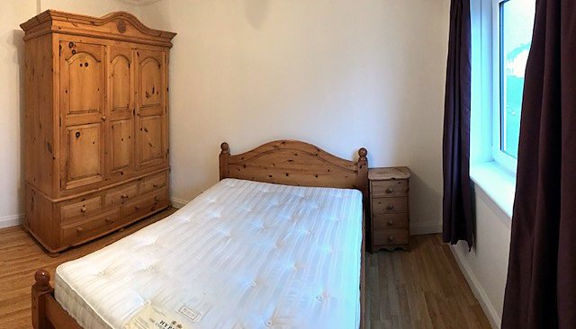 Bedroom at Renovated Bright Two-Bed Flat With Balcony, Cameron Toll / south-east Edinburgh.