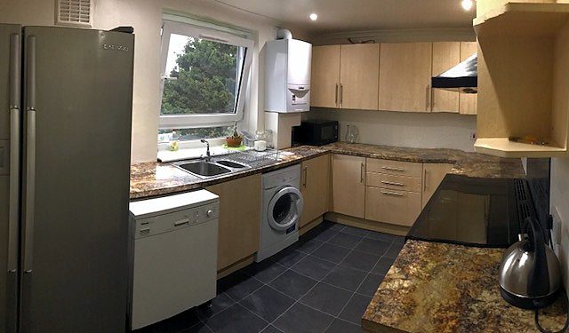 Kitchen at Renovated Bright Two-Bed Flat With Balcony, Cameron Toll / south-east Edinburgh.