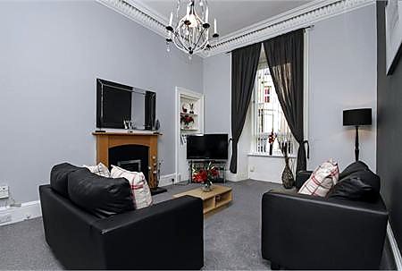 Living room at Large Two-Bed Tenement Flat Near Easter Road, Easter Road / east central Edinburgh.