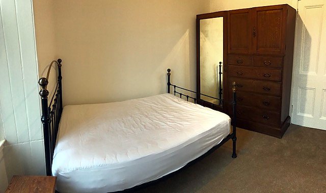 Bedroom at Bright Quiet Central Flat With Crags Views, Holyrood / Royal Mile area.