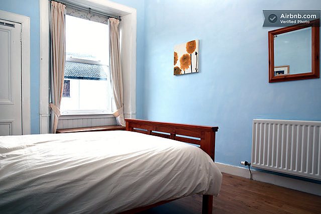 Bedroom at Bright Quiet Central Flat With Crags Views, Holyrood / Royal Mile area.