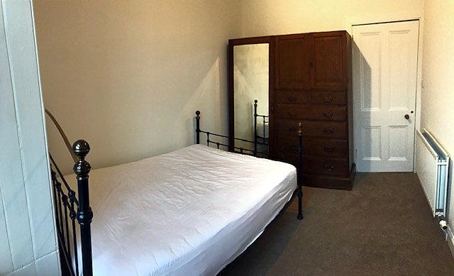 Bedroom at Bright Quiet Central Flat With Crags Views, Holyrood / Royal Mile area.