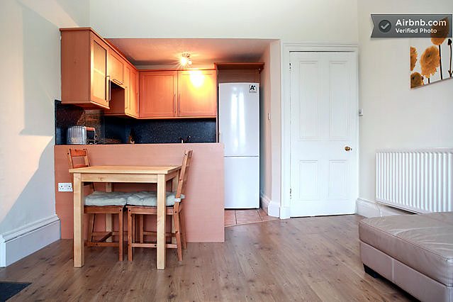 Living room at Bright Quiet Central Flat With Crags Views, Holyrood / Royal Mile area.