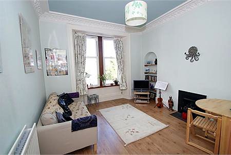 Living room at Bright Quiet Central Flat With Crags Views, Holyrood / Royal Mile area.