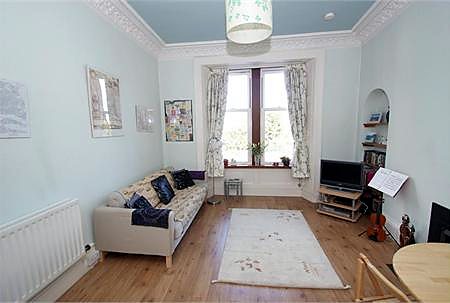 Living room at Bright Quiet Central Flat With Crags Views, Holyrood / Royal Mile area.