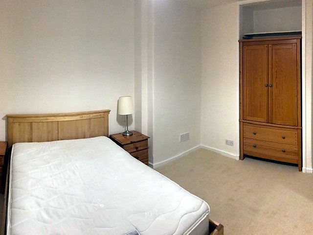 Bedroom at Renovated Three-Bed House With Gardens, The Inch / south Edinburgh.